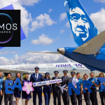 Alaska Airlines with the pilots in front cheering and celebrating