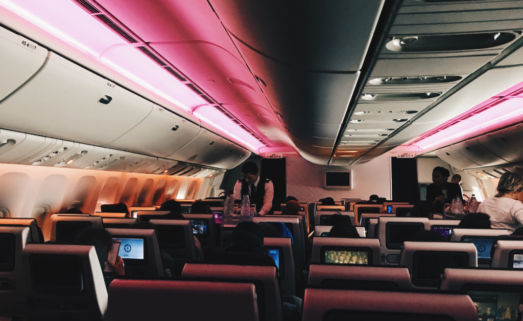 Aircraft cabin interior representing airline seat change rules after booking in 2026.