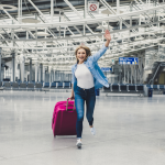 Passenger running through airport after missing a boarding call under 2026 airline gate policies.