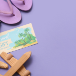 Travel voucher with travel accessories representing airline travel credits and vouchers in 2026.