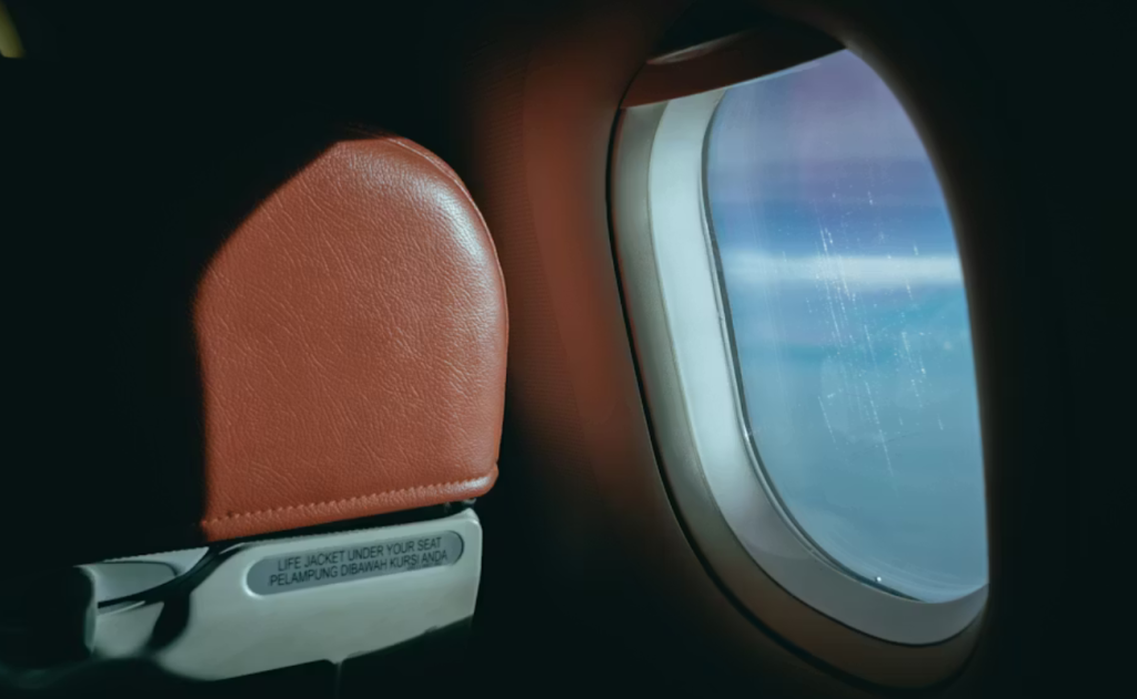 Window seat inside an airplane cabin